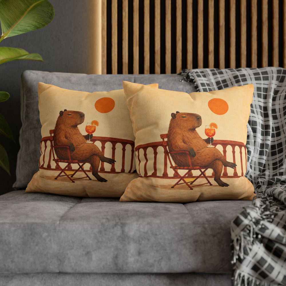 Aperol Hour – Aperol Spritz with a Capybara on a Golden Balcony – Pillow / Cover