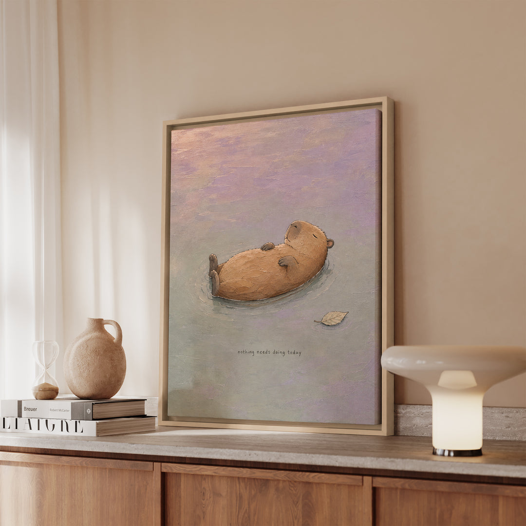 Nothing Needs Doing – Calming Wall Art with a Capybara Afloat at Dusk – Canvas / Framed Canvas
