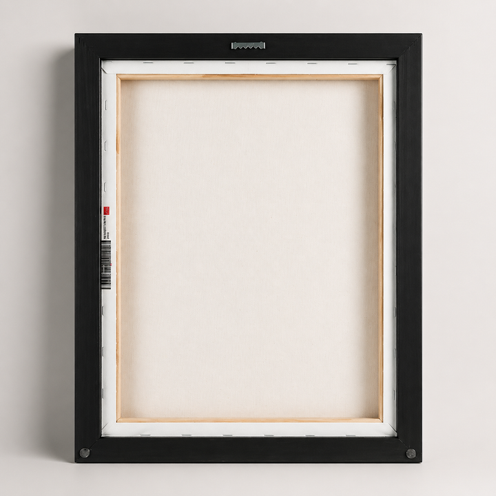 A black-framed canvas with a blank white canvas inside, set against a plain white wall.